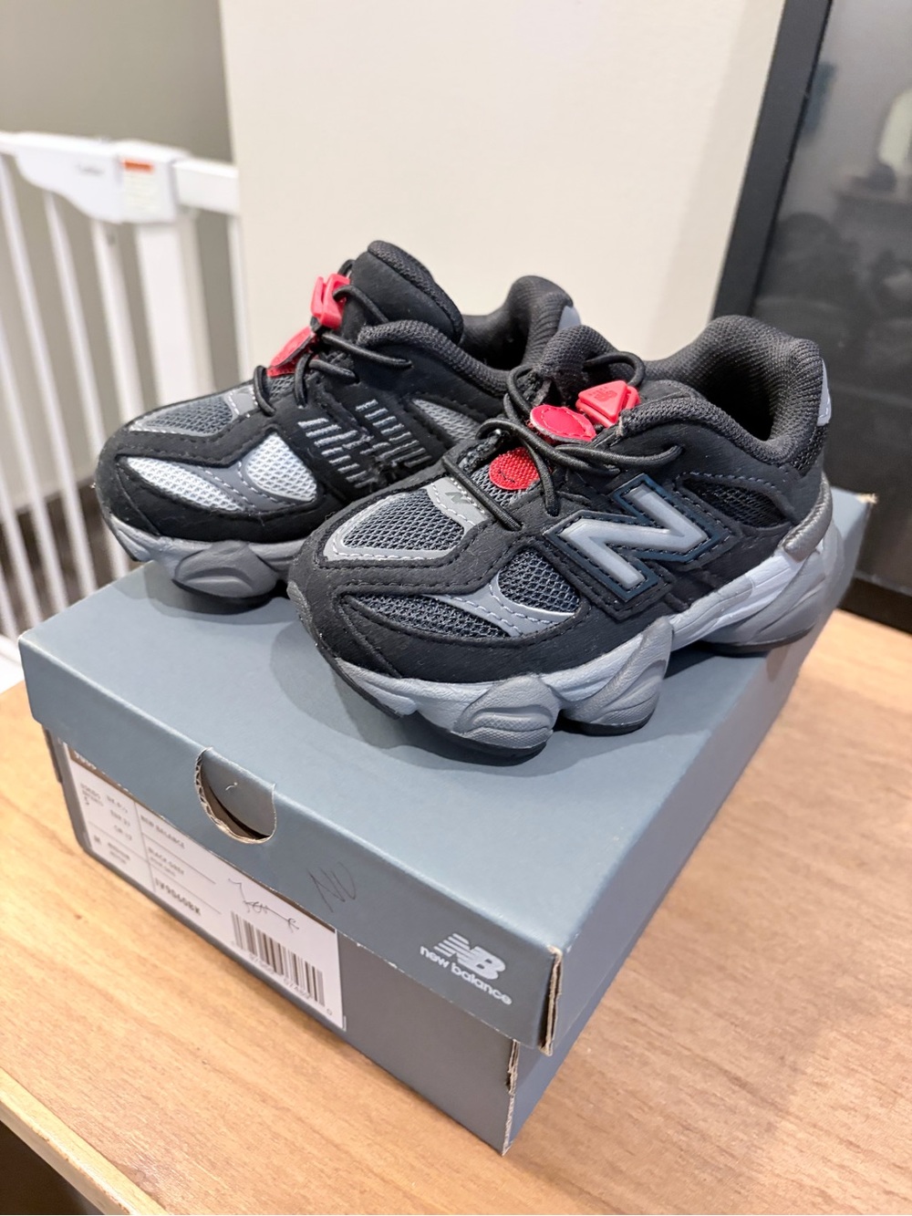 New Balance Kids Black & Gray Sneakers with Red Pull Tabs